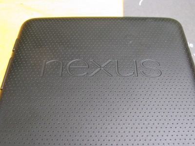 The back of the Nexus 7 is textured black rubber for a good grip. This was listed as being brown, but it looks black to me.